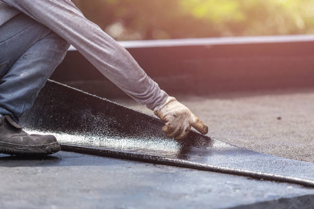 Professional Basement Waterproofing technician working in Bellmawr, NJ